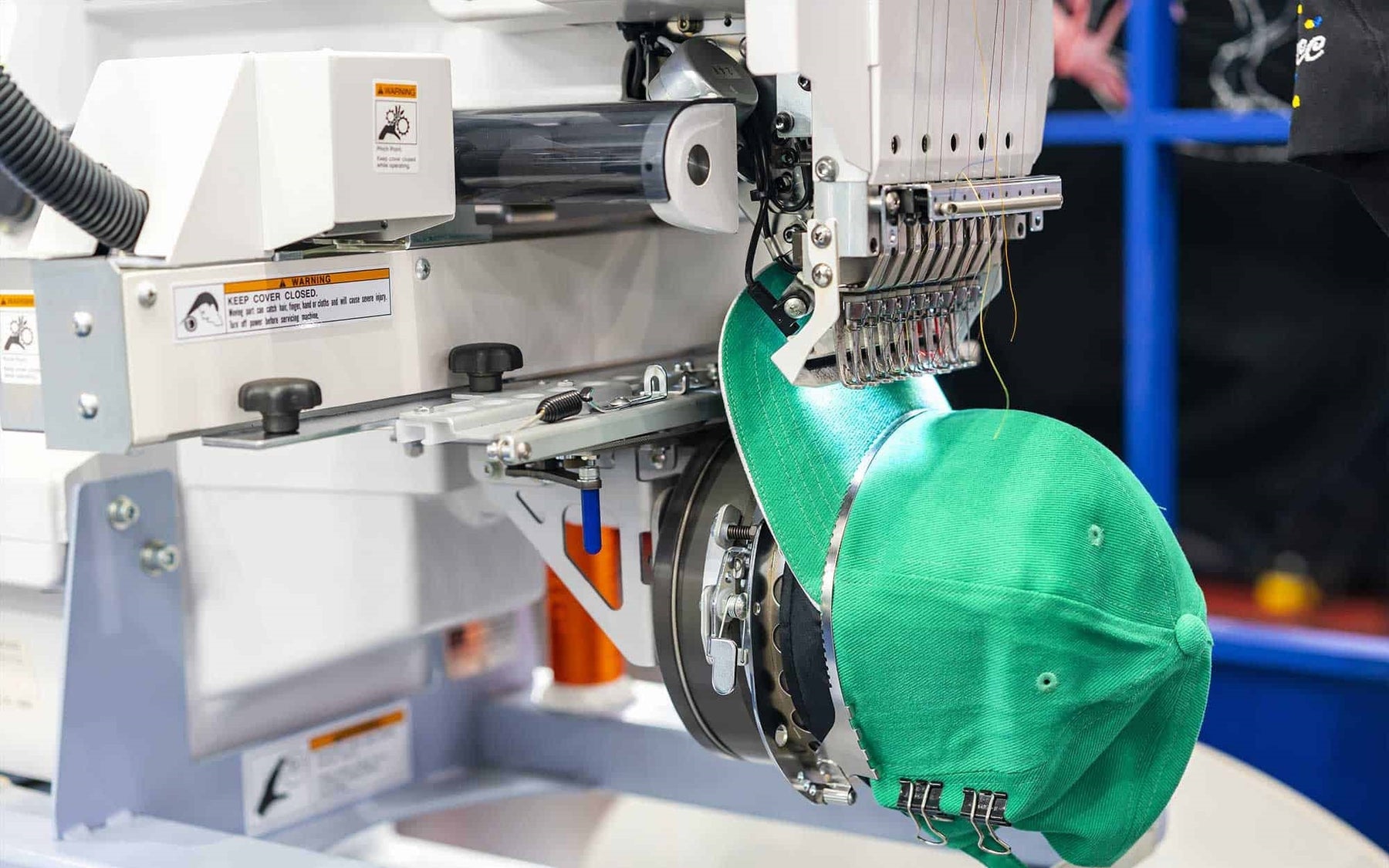 Borduren voor bedrijfskleding, petten en premium kleding